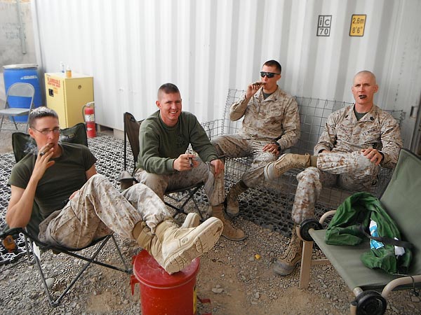 Spencer Thomas and the boys enjoying some cigar goodness in Afghanistan.