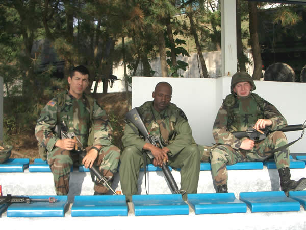 The "Stogie Boys" from the Avenger Section/ D Co/ 702D MSB from Camp Casey, Korea smoking Drew Estate cigars during a Live Fire Exercise at Chulmae Range, Korea. Thank you for your World Class service CI... Dragon Warriors !!!Left to Right: 2LT Jonathan "Fernie" Fernandez, SSG Larry "Reaper" and PFC "Smiley" Albright