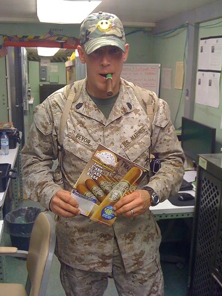 Gunny Devor after receiving a shipment in Southern Afghanistan. "Thanks CI for the fast shipment."