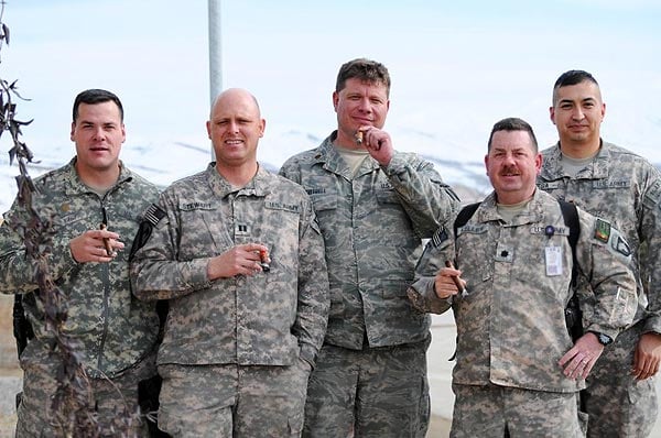 Soldiers of the Operational Coordination Center Region East, OCC-R(E), Afghanistan. "We enjoy smoking cigars as we discuss business, game plan, and coordinate efforts throughout the day."