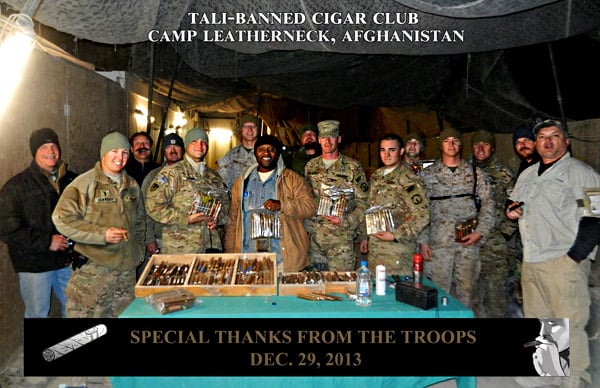 "Again, thank you very much for your donations to the Warriors here at Camp Leatherneck. The picture submitted is from one of the coldest nights we have had here yet and it was below 20 degrees. Everyone was impressed with the cigars and I kept hearing "oh, this is a good one" as they went through them. The group may appear small but again with missions going on, we have between 20 and 50 show up every Sunday. The West Coast is showing up to replace the East Coast as we speak, so the club will continue, much of it is due to your help."