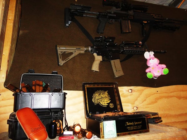 Casey Cordova&rsquo;s cigars and firearms. "Thanks for your excellent customer service here in Afghanistan."