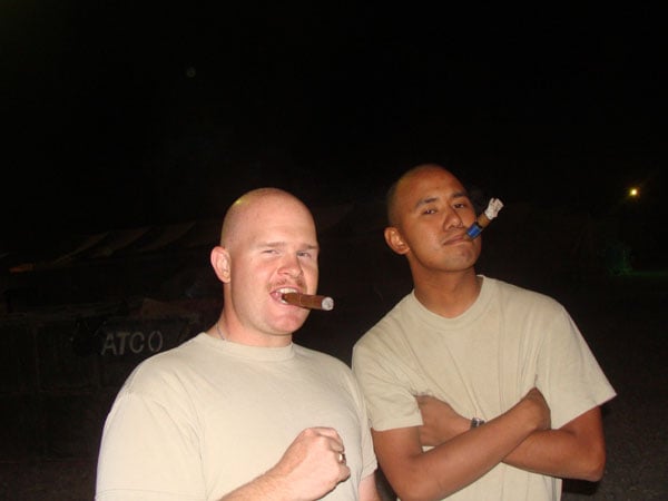 Soldiers enjoy their "cigar night" in Iraq, which is more of an opportunity to bond and decompress as it is to share tastes in fine cigars.