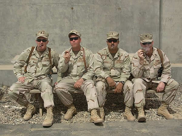 From left to right: AFCM(AW/NAC) Mark Little, AZC(AW) Mark Wingate, DCC(SW) Larry Lopez, and CMDCM(SS) Dave Stahura celebrating the 114th U.S. Navy Chief Petty Officer Birthday on April 1st, 2007 at Camp Bucca, Iraq.