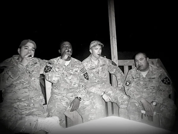 Officers from 1st Battalion, 37th Field Artillery Regiment, Combined Task Force - Arrowhead at their weekly cigar night in Afghanistan. "We&rsquo;re frequent customers of your company, and glad you guys get products shipped here so fast to APO addresses."