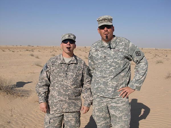 L-R: SSG Brouillard and SSG Tirsell on their construction site enjoying a couple of 5 Vegas Relics.