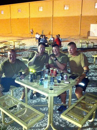 Brandon Simons, Jimmie Mckinney, Karl Kieffer, and Eric Montag in an undisclosed location in south west Asia. "Good times had by all!"