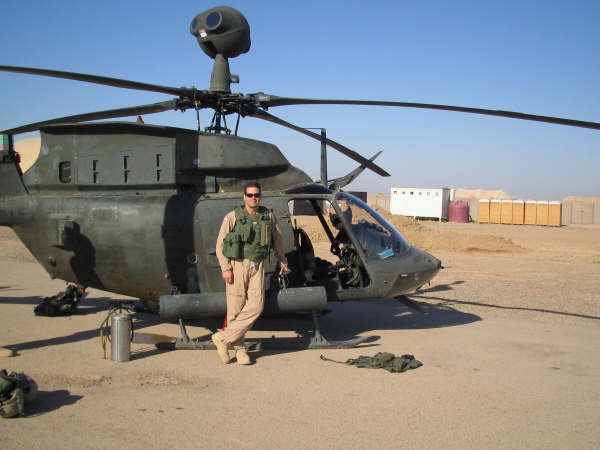 Bradley Gammons near his aircraft at FOB McKenzie in Tikrit.