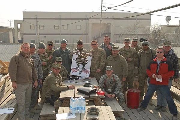 The Tali-Banned Cigar Aficionado Cigar Club hanging out on top of the Tiki Hut cigar lounge at Camp Phoenix, Afghanistan. "Couldn&rsquo;t make it through the day around here without a good cigar from Cigars International. Thanks for keeping the prices the best in the business."