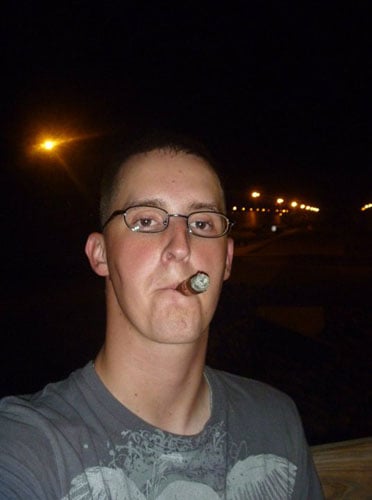 CPL Justin Lumsdon in Djibouti smoking a Drew Estate.