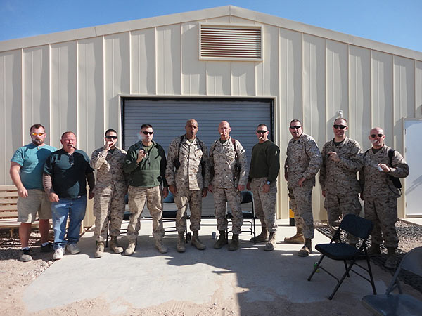 The Marines, Sailors and Contractors of 2nd Marine Aircraft Wing Forward Aviation Logistics Department/Forward Deployed Combat Repair enjoying a variety of cigars from Cigars International on New Year&rsquo;s Day, 2012.