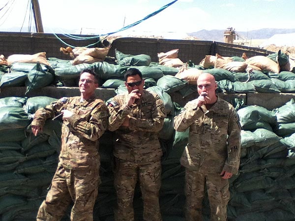 HHC, 725th BSB (A) Soldiers enjoying a cigar after a hard days work in Afghanistan.