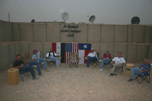 The Ar Ramadi Social Smokers Club.From left to right: Doug Saam is smoking a Montecristo, Dan Hilbun is smokinga Perdomo # 2, Jurgen Stringer is smoking a Cohiba (D.R.), Dave Hallidayis smoking a Nestor, Jason Walsh is smoking a Rocky Patel Vintage 1990,Darwin Mixon is smoking a La Veja de Havana, Richard Batzel is smoking a Romeo Y Julieta, Noshi is a non-smoker.