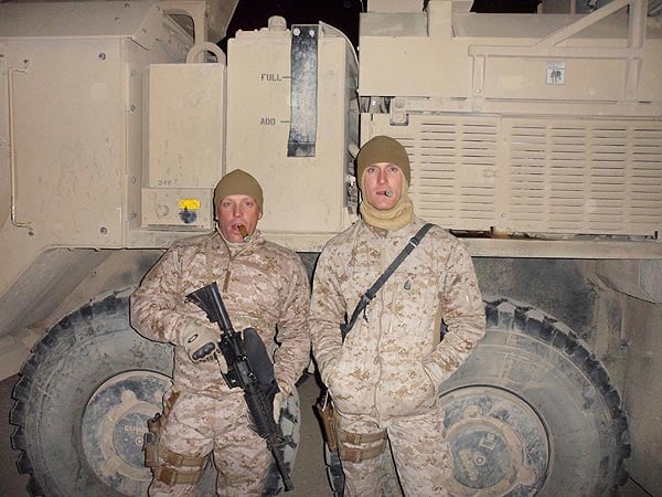 Spencer and John getting ready for a convoy in Afghanistan
