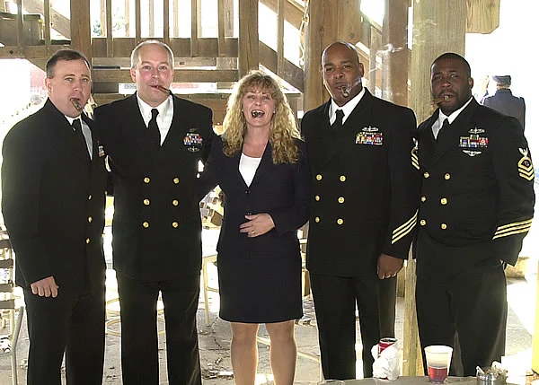 Veterans of Operation Enduring Freedom and Operation Iraqi Freedom.  Mike, Randy,Penny, Lorenzio and Albert from Tactical Air Control Squadron 22 enjoying some finecigars in Virginia Beach, VA at Randy&rsquo;s retirement from the US Navy November 2004.