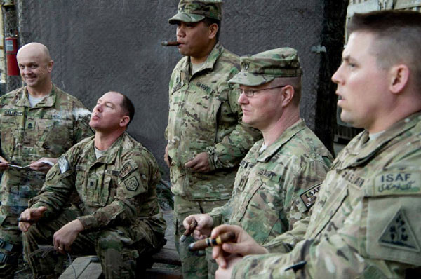 The guys from Camp Eggers, Afghanistan having a break enjoying a stogie...