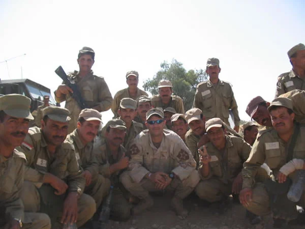 (Center) Spc Jason Grove, Natural Elixir 5-50, with 3rd Platoon D Company106th ING before their stress shoot at Marez range FOB Marez, Mosul, Iraq.