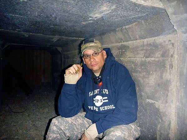 CPT Sgroi in Afghansitan OEF10-11, smoking in the bunker at small COP prior to mission.