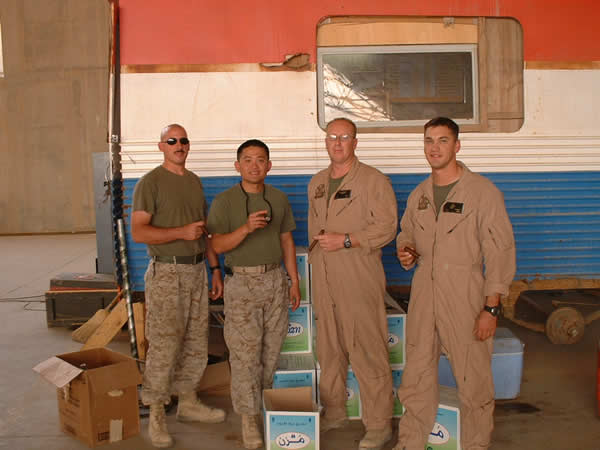 From left to right SSgt Koenig, SSgt Rena, GySgt Eberle and GySgt Romero enjoying Punch Rare Corojo&rsquo;s, Montecristo and CAO Brazilia Gol. We are currently located in Al Anbar Province, Iraq in support of I MEF.