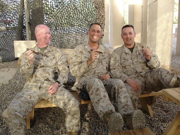 The 5th Civil Affairs Group in Camp Fallujah, Iraq, enjoying an after-dinner smoke.