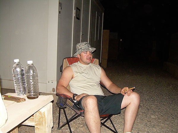 SOTF-N Cigar Club member SGT Lamon at COB Speicher having a smoke.