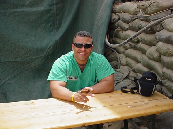 1LT Nunez from the Task Force Med 115th at the Abu Ghraib Prison in Iraq enjoying an AVO cigar.