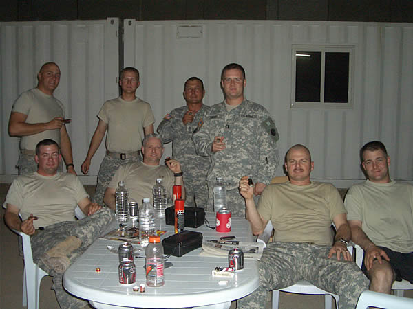 Soldiers in Camp Speicher, Iraq during change of command process. The old and new officers and enlisted soldiers enjoying quality cigars from CI.