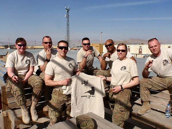Navy Expeditionary Logistics Support Group Mike Forward Rotation Dirt Sailors, enjoying a sunny day, great shipmates, and a few stogies on top of the Tali-banned Cigar Aficionado Club Tiki Hut!