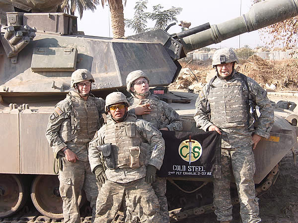 Soldiers stationed in Ramadi, Iraq enjoying some well deserved Gurkhas.