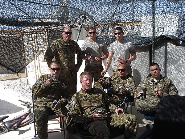 Troopers from D Troop, 7-17 CAV (TF Palehorse) enjoying some cigars in Afghanistan.