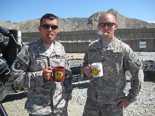 CPT James Mason and 1LT Mike Brennan (A/2-320th FAR, 1BCT, 101st ABN) enjoying an afternoon smoke at COP Garcia, Afghanistan.