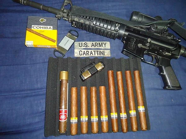 Spc. Carattini, M&rsquo;s Cuban Cohiba&rsquo;s resting in a in travel humidor bought from CI. "I decided to take a picture so all cigar aficionado&rsquo;s can have a glance at these babies.."