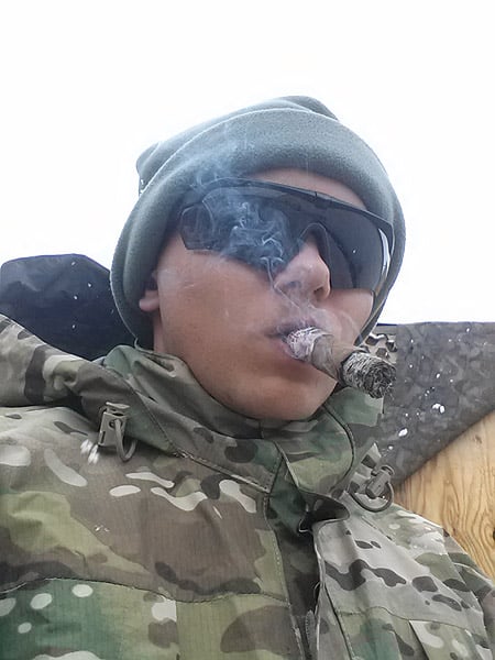 SPC Ryker Cabler in Afghanistan smoking a Nicaraguan cigar. March 2013