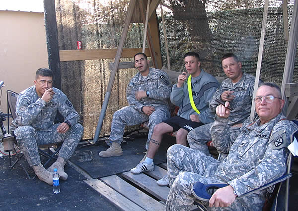 COL Haun, CPT Dennis, LT. Rodriguez, 1SG Sprunger & SGT Dallas, enjoying a well-deserved cigar after a hard work at Bagram Airfield, Afghanistan.