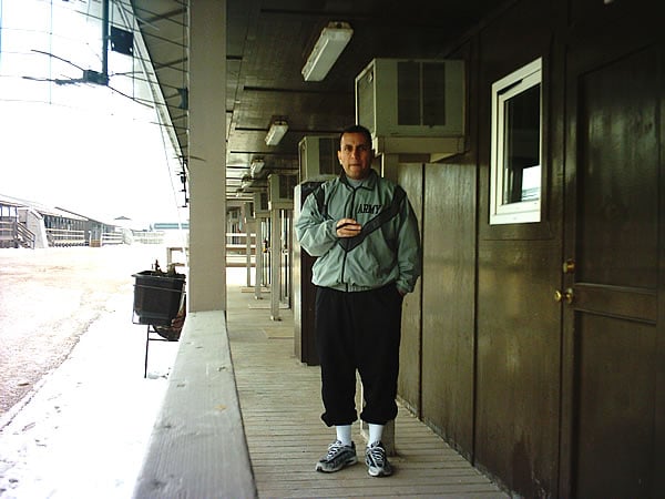 MSG Joe Castro, of Task Force Falcon, enjoying a Gloria Cubana outside the living quarters of Camp Bondsteel, Kosovo.