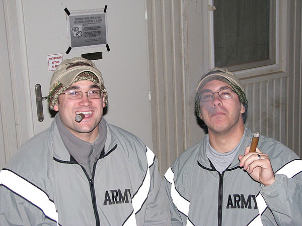 SGT Nick Musser and SGT Frank Kiler from Det. 1 Co. D 126th AVN, PA&rsquo;s finest Sherpa unit enjoying some &rsquo;fine smokes courtesy of Cigars International&rsquo; in Iraq, 2011.
