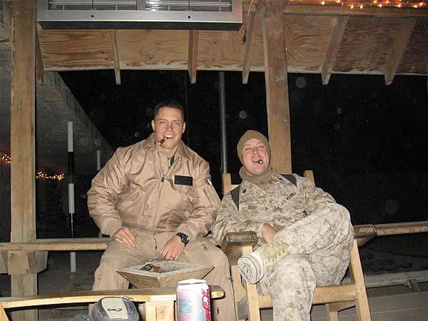 Huey Pilot Capt. Thompson and Crew Chief Sgt. of HMLA-169 in Iraq.