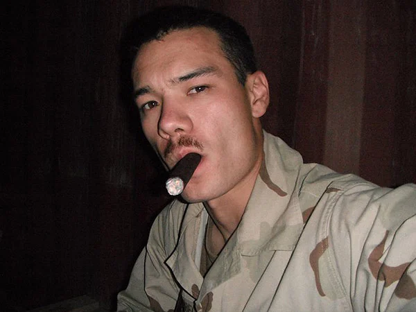 ET3 Hallenbeck enjoying a nice maduro at Camp Krutke aboard Camp Leatherneck in Afghanistan.Naval Mobile Construction Battalion 5Fall 2010