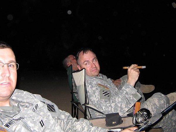 The "Scorpion Cigar and Fishing Club" in Baghdad Iraq. Captain Gary Whittacre (fishing) and LTC Kent Wiley smoking a Stradivarius Cigar. What a way to end a long day in Iraq.