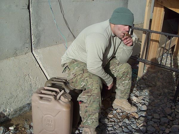 Sgt. David Rosado smoking a Cohiba in Afghanistan