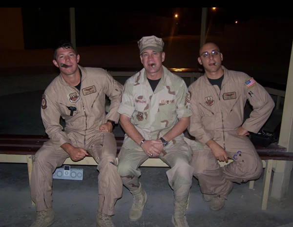 SRA Davidson,TSgt Campalone, & SRA Green enjoy a well deserved cigar taken at the Coalition Compound on 04-16-07.