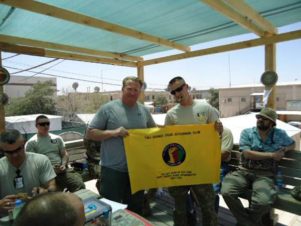 SSgt Anthony Winters during a Talibanned Cigar Afficionado Club meeting in eastern Afghanistan late July 2013.