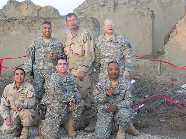 MAJ John C. Jacobi and crew enjoying some cigars.