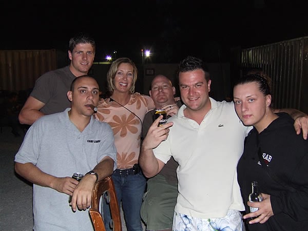 SRA Joshua Green enjoys a Monte Cristo #2 and a cold one with some British counterparts.