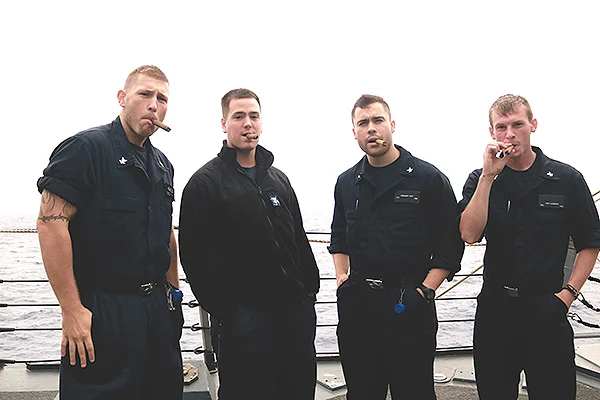 L to R: PO2 Harrelson, PO2 Harrelson (yes were cousins), PO3 Dipp, PO3 Aleksich"Sending some appreciation from some forward deployed sailors! We&rsquo;ve all purchased many cigars from you and you guys have always delivered with zero problems. We enjoy our cigars daily and have expanded our group to a sizeable number of people now. Thank you again!"