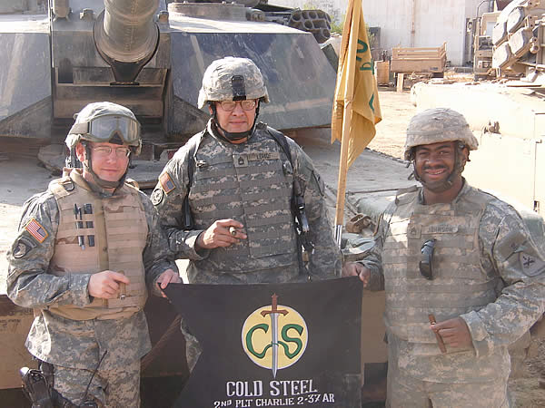 Soldiers stationed in Ramadi, Iraq enjoying some well deserved Gurkhas.
