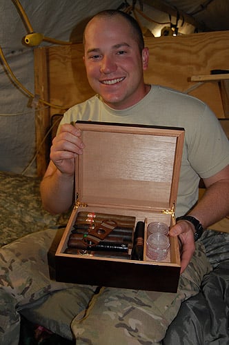 LT Weadon with his new humidor and cigars from Cigars International