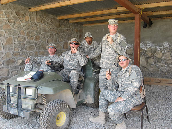 Members of PRT Sharana, 1SG Niemritz, LT Musket, SGT Robinson,  Chief Delgrande, and CS1 Offutt from FOB Sharana, Afghanistan enjoying a variety of cigars from Cigars International!