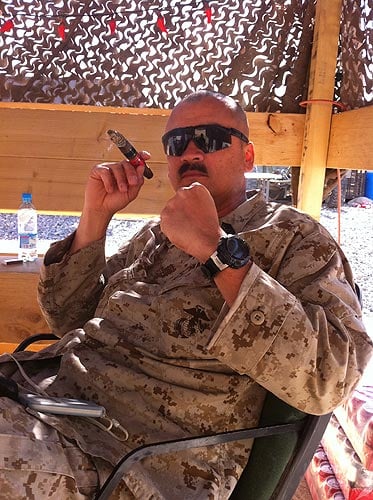 "Combat Carl never stops, but when he does, it&rsquo;s with a cigar." Afghanistan, 2011.