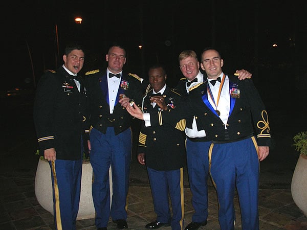 The command group of the 1st Battalion, 25th Attack Regiment stationed in Hawaiienjoying their favorite cigars from their favorite cigar company.